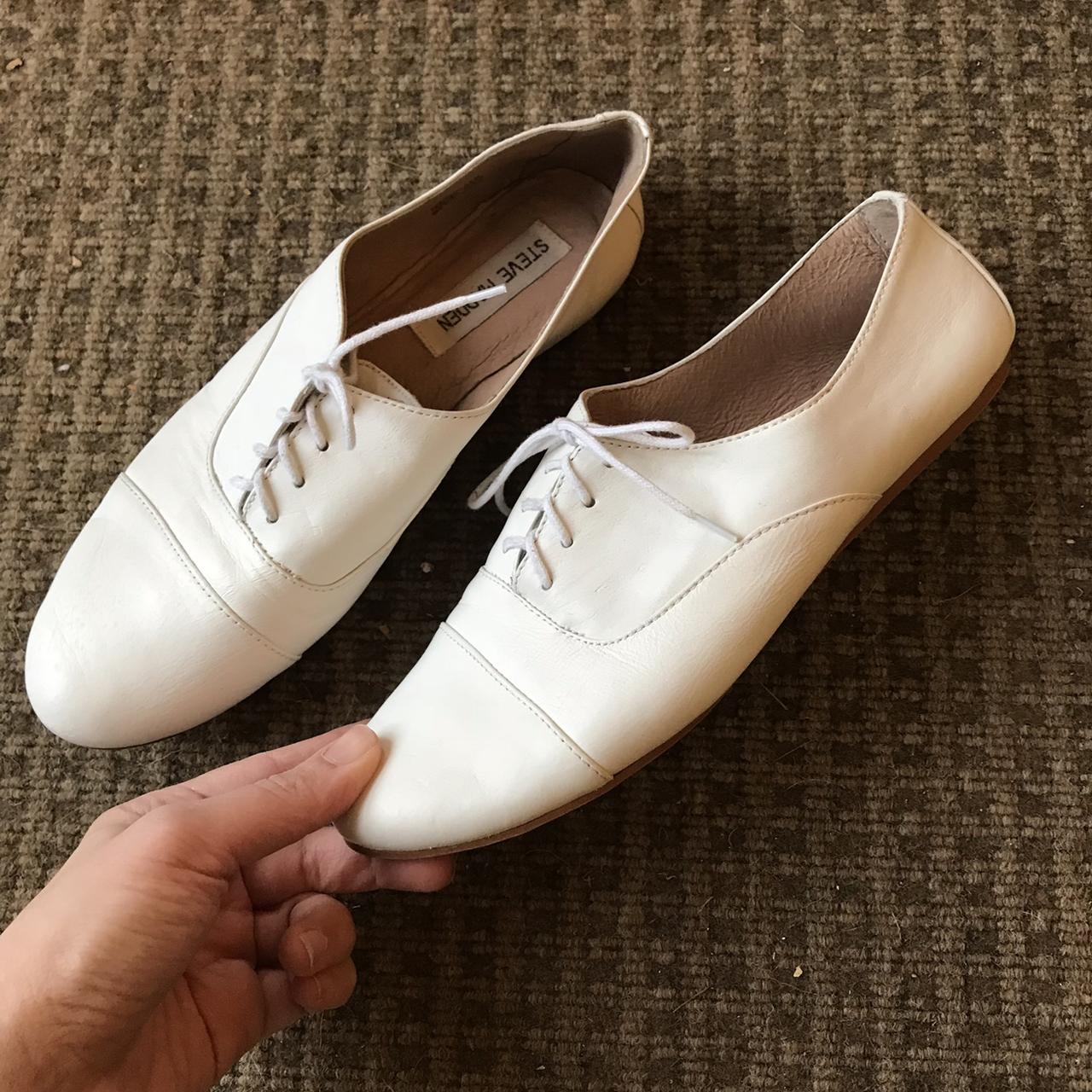 Contemporary white leather lace up flats by Steve... - Depop