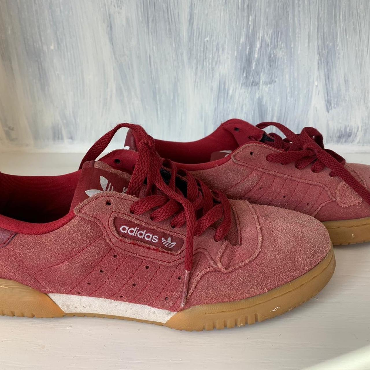 pink and red adidas trainers