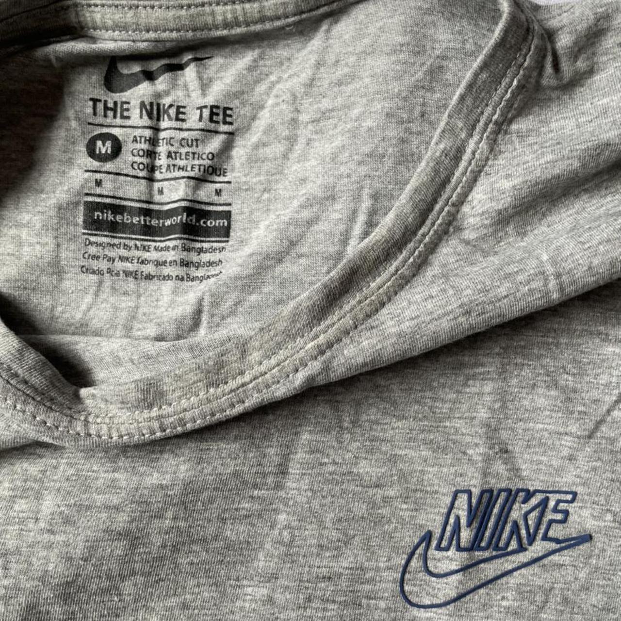 vintage grey nike tshirt size M would fit women’s... Depop