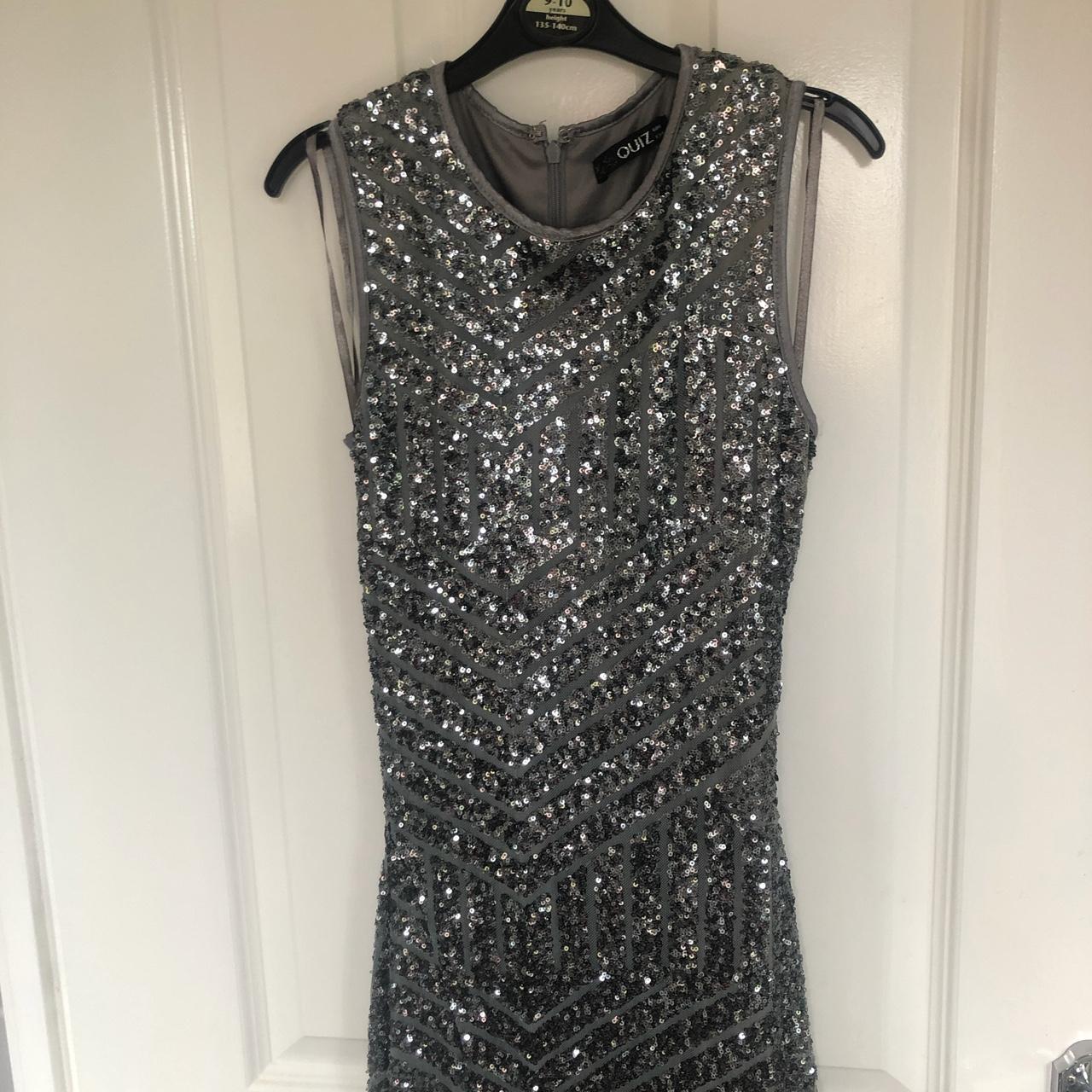 Silver sequinned maxi dress with a slit in the skirt... - Depop