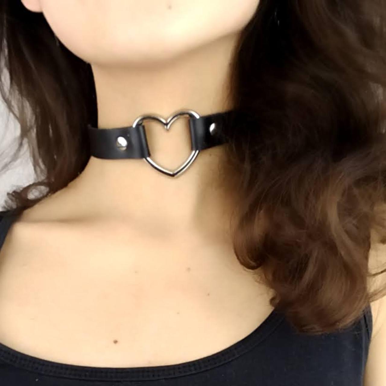 Sweet littl black leather choker with heart detail.... - Depop