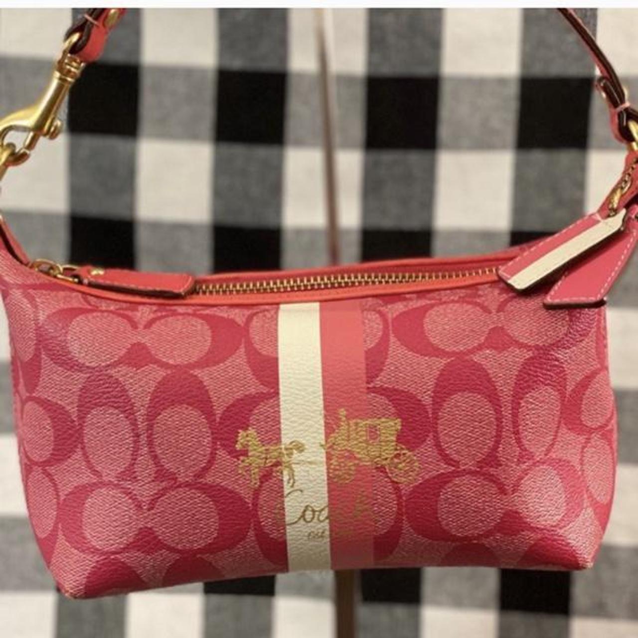 small pink coach purse
