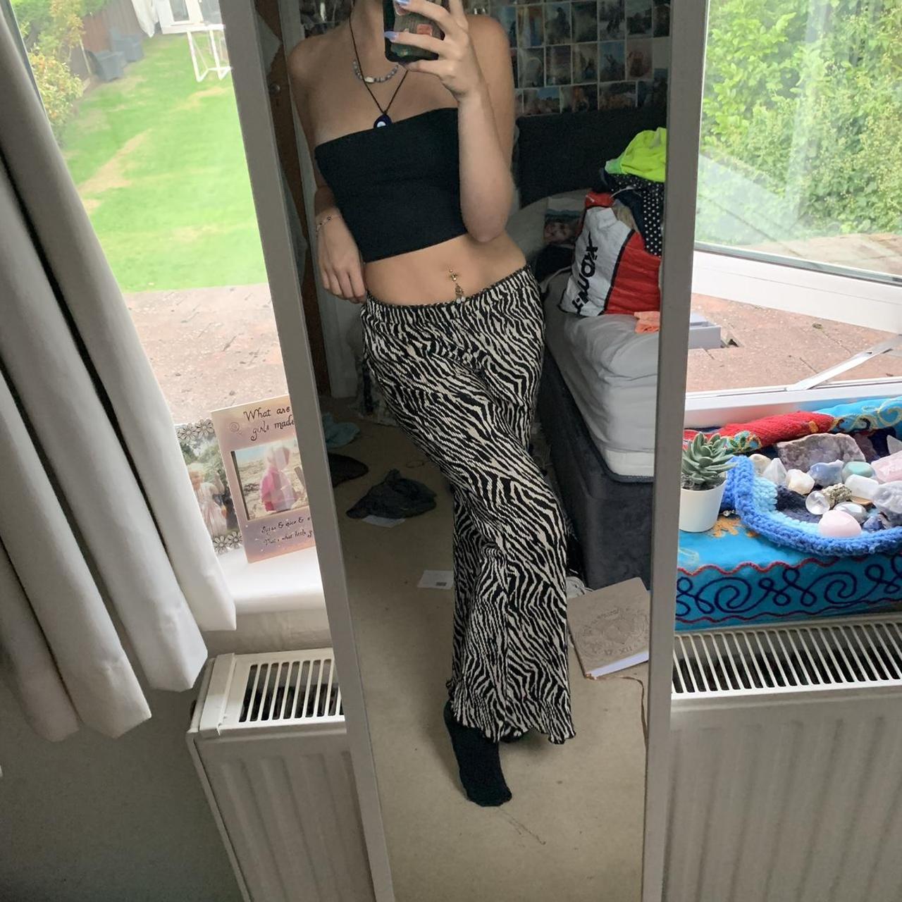 zebra print gold and black ribbed flared trousers... - Depop