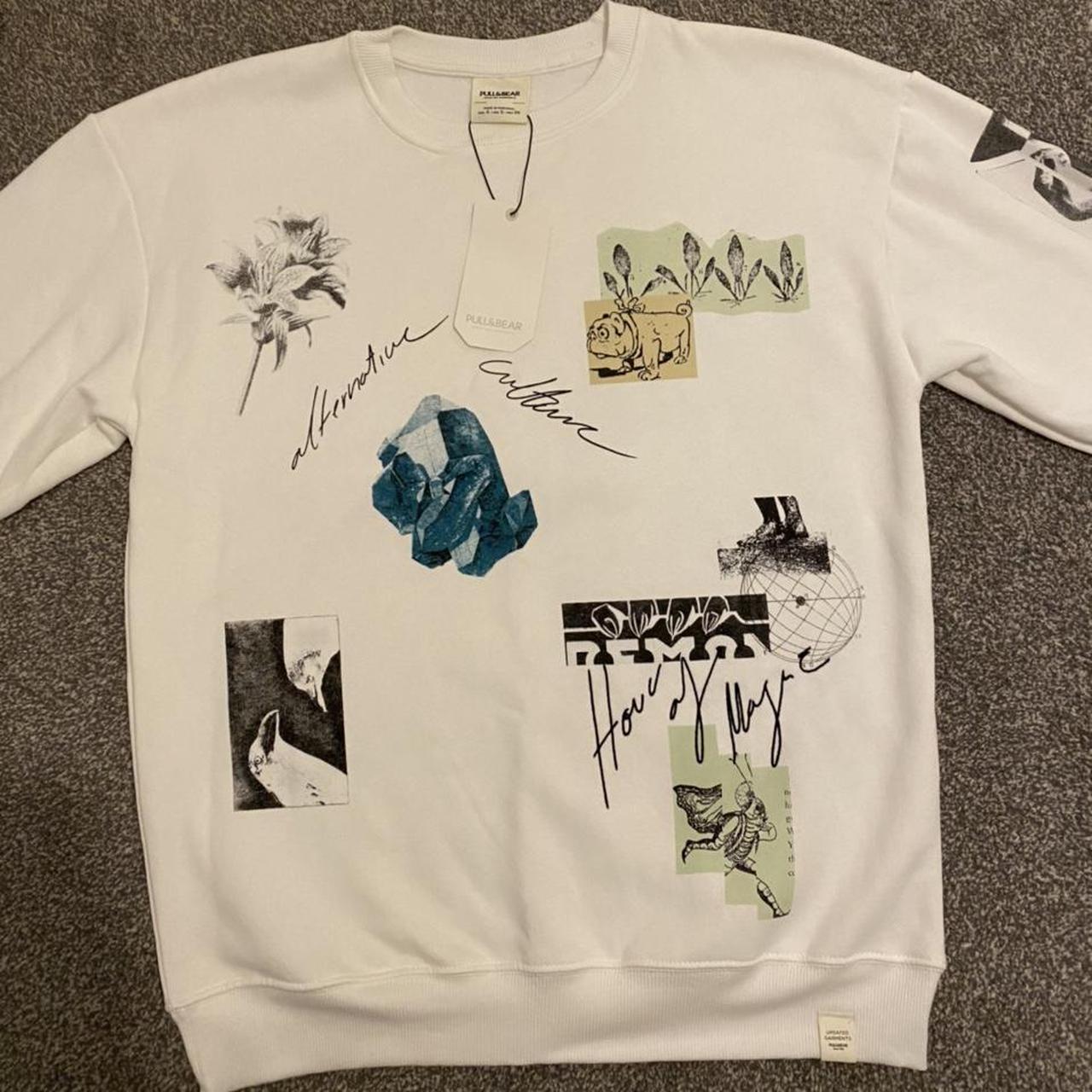 White mens pull&bear sweatshirt with graphics... - Depop