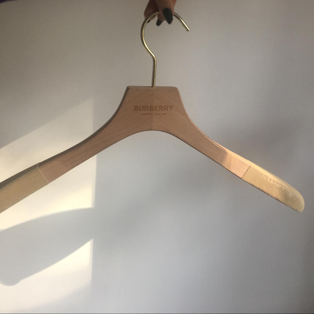 Luxury Burberry hanger for coats. Strong wood frame... - Depop