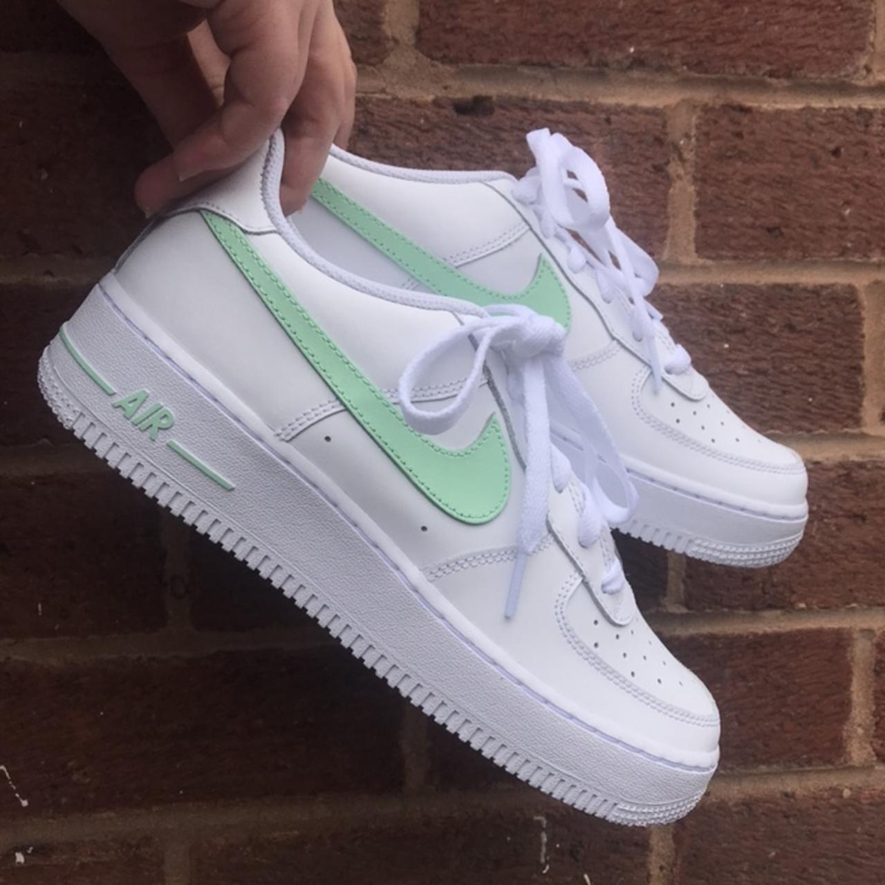 white air force with green tick