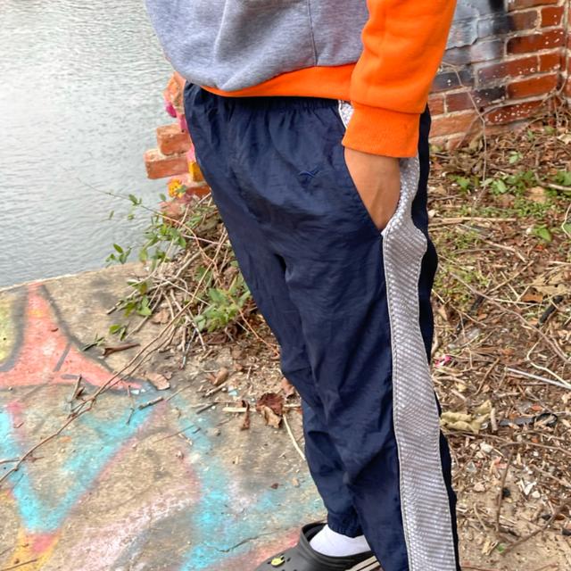 Louis Vuitton swishy track pants cut/sewn from real - Depop