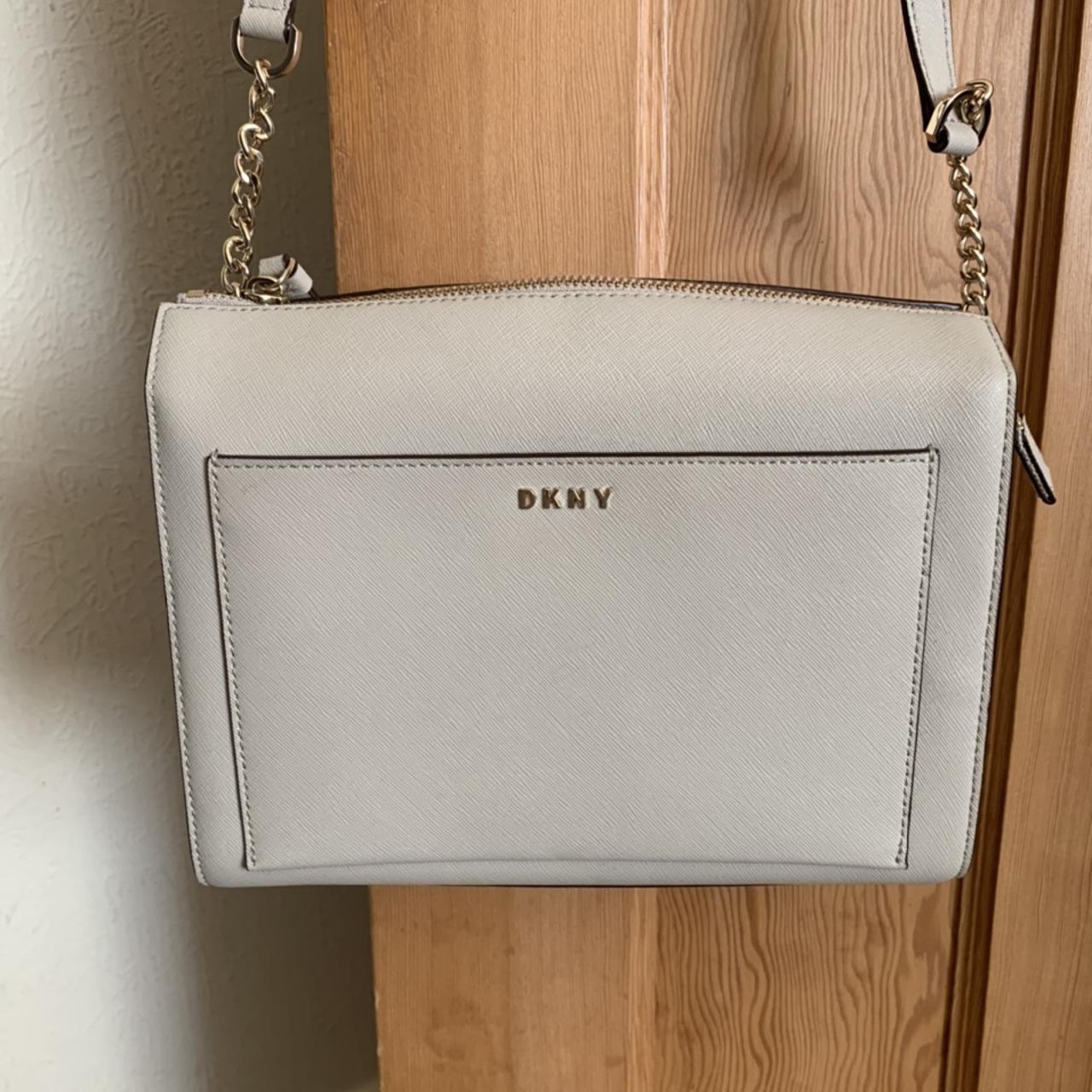 DKNY crossbody bag in light grey with gold hardware.... Depop