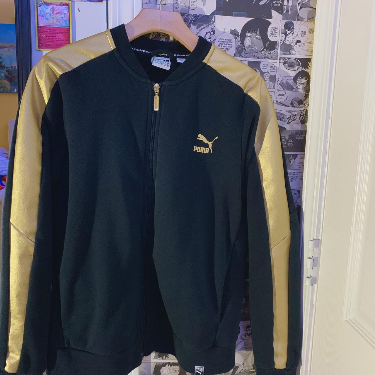 Black and outlet gold pumas jacket