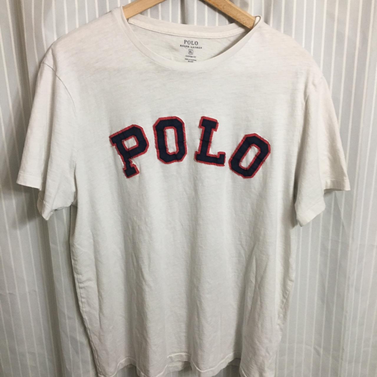 White polo tee with polo spell out stitched on the... - Depop