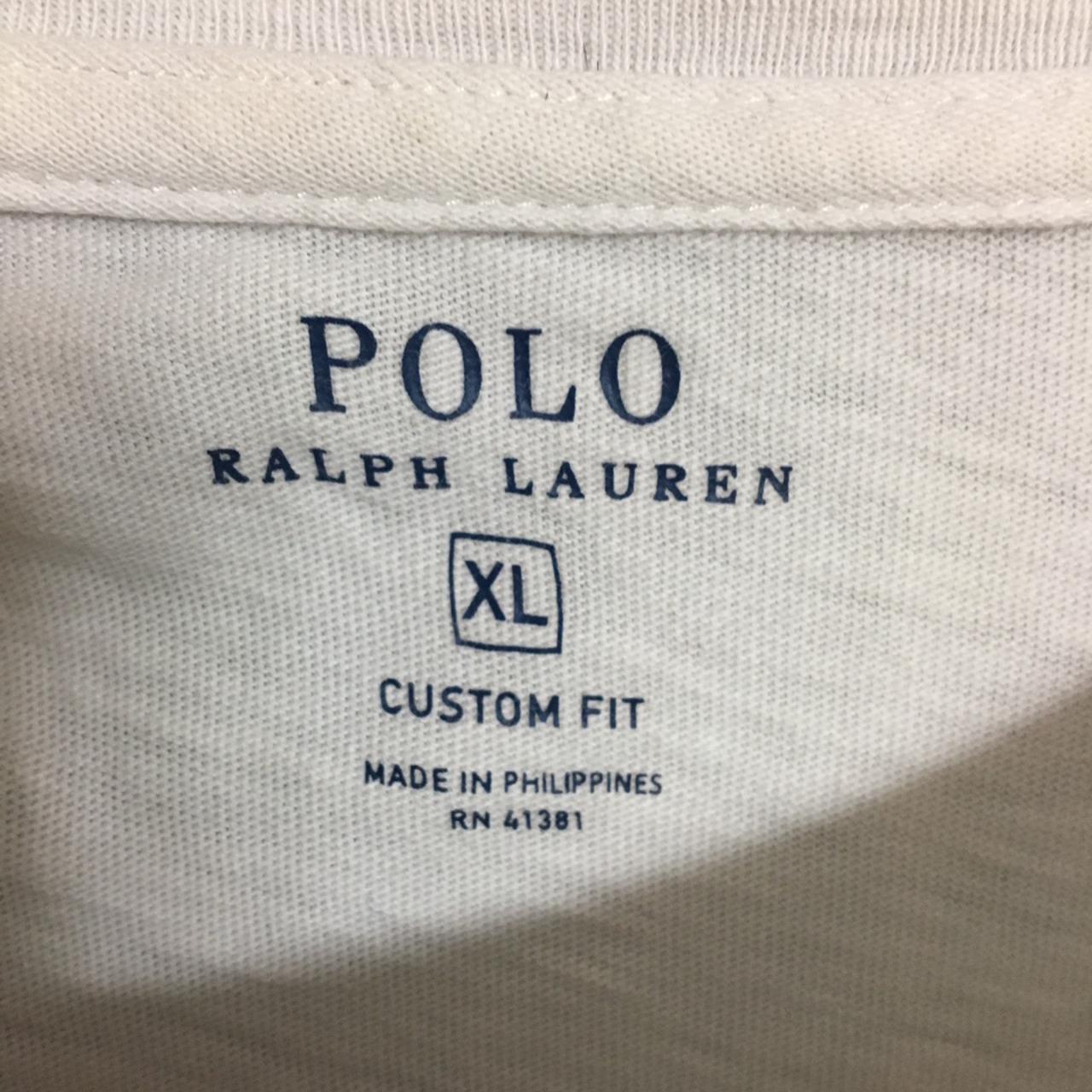 White polo tee with polo spell out stitched on the... - Depop