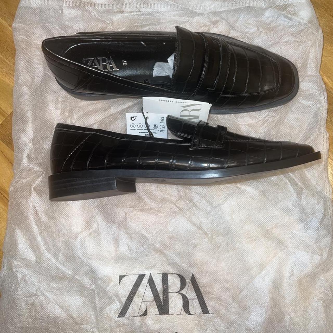 size 4 black loafers