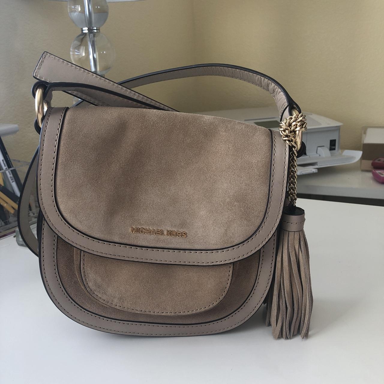 Michael Kors Dunn saddle bag in color shell. Size. Depop