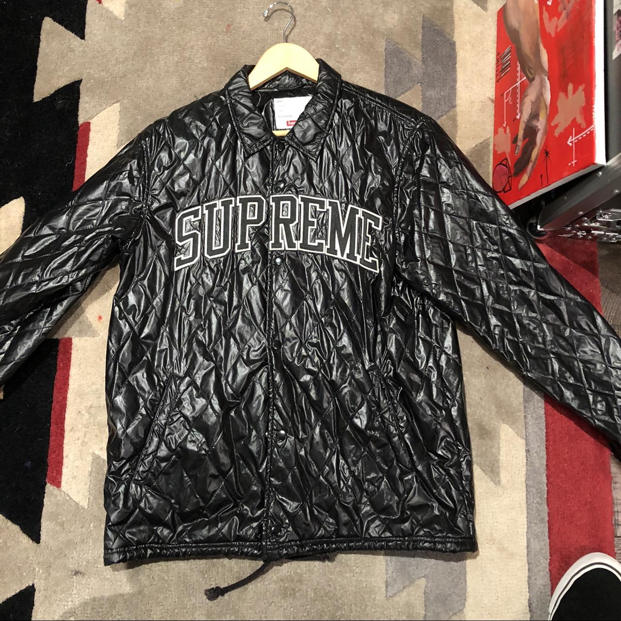 Supreme Black quilted coaches jacket. Small tear on...