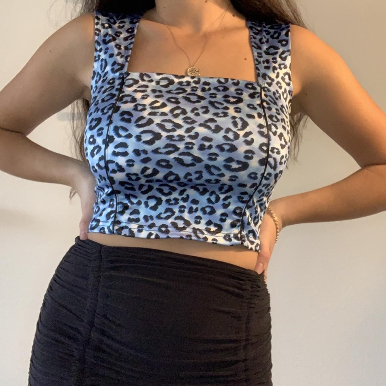 Cheetah with Louis Vuitton faux leather top. Like - Depop