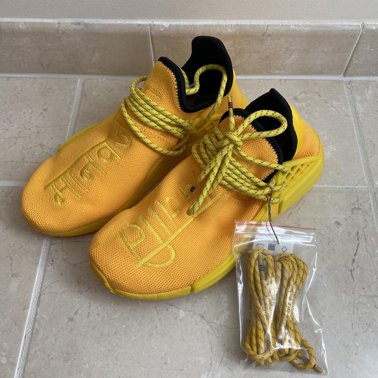 Nmd yellow human race best sale