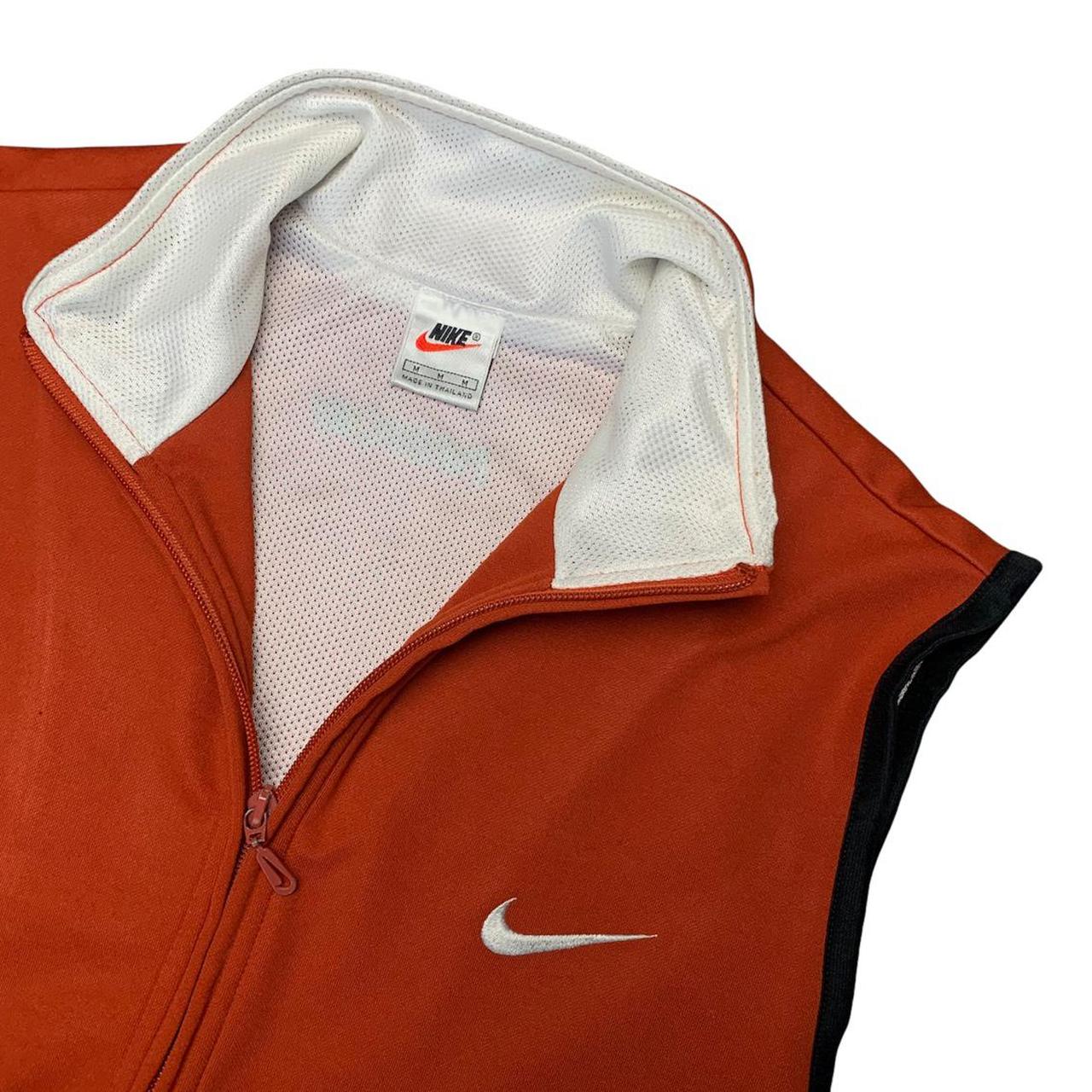 nike orange body warmer