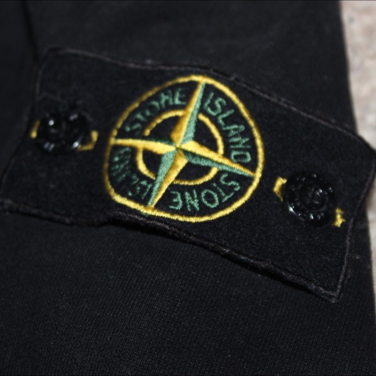 Stone Island men’s black pocket sweatshirt, part of... - Depop