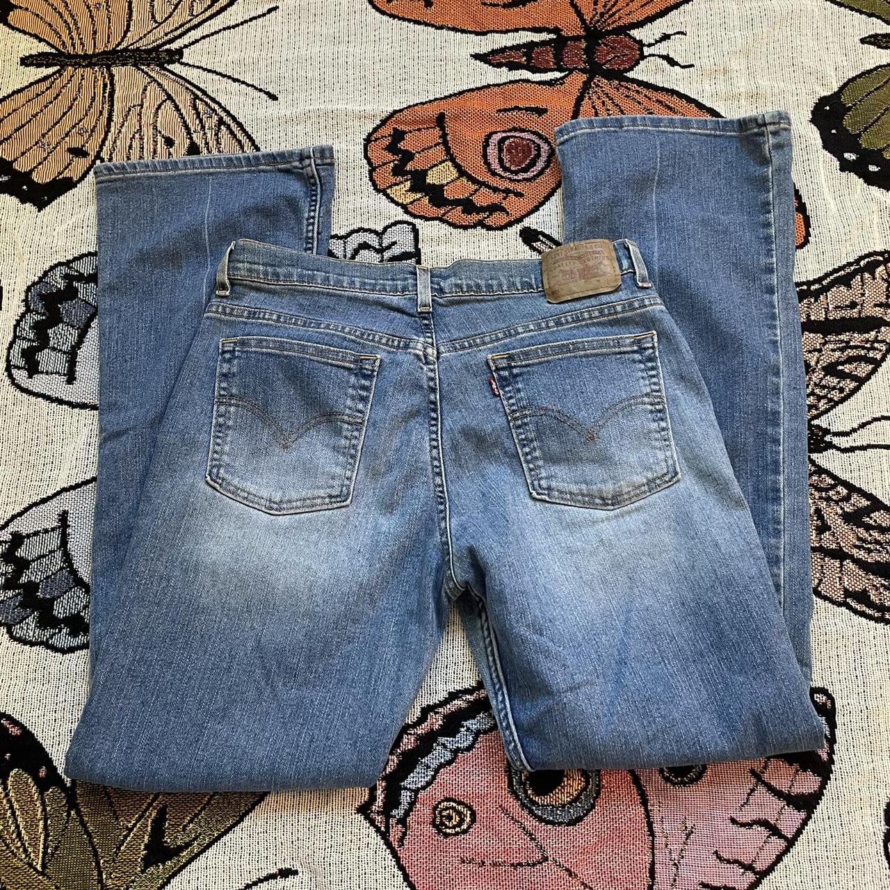 Vintage medium wash mid-rise flare jeans from Levi’s... - Depop