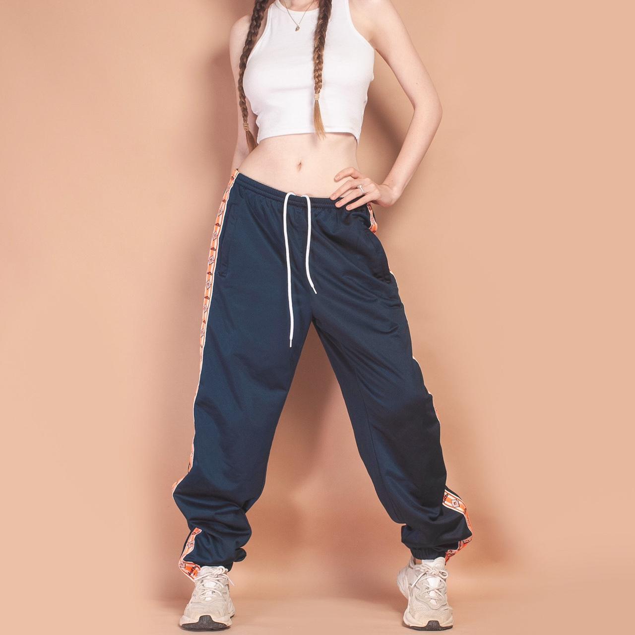 Vintage Lotto track pants low rise in navy with... Depop