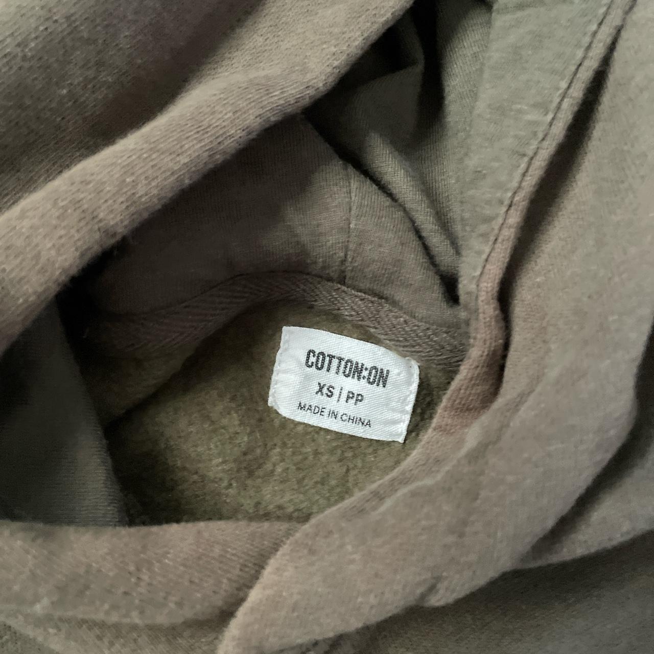 Army green mens xs cotton on hoodie. Works for women... - Depop