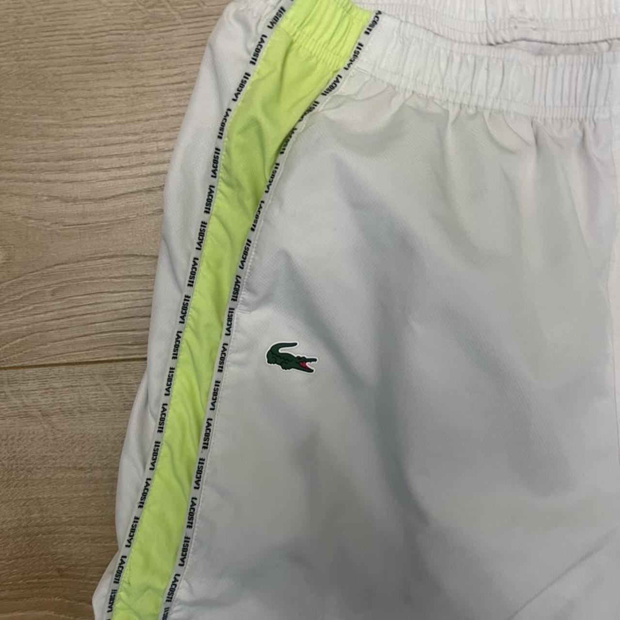 white with green/yellow stripe lacoste tracksuit... - Depop