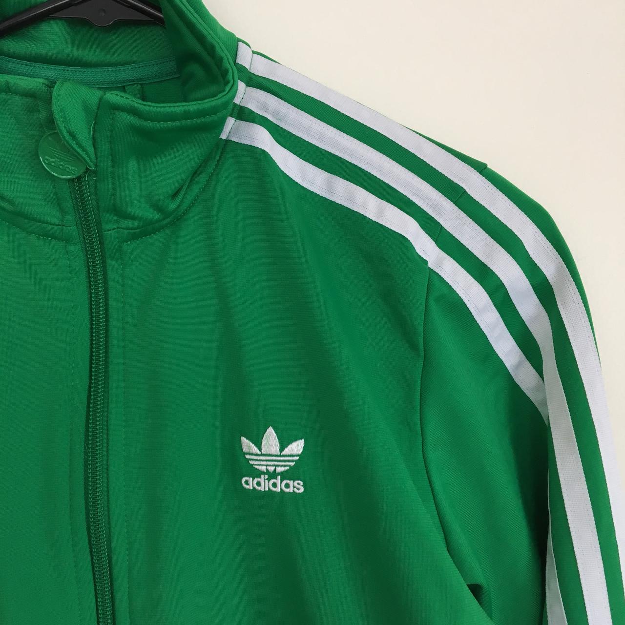 green adidas zip-up jacket! Super hard to find in... - Depop