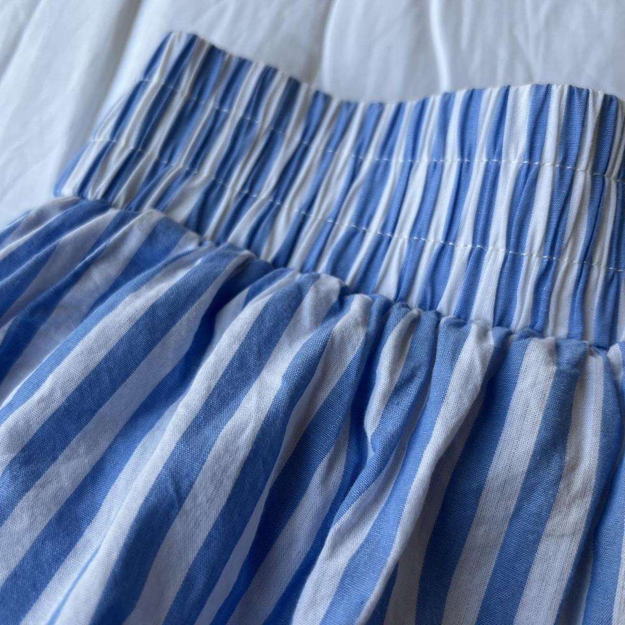 Lioness Men's White and Blue Shorts Depop