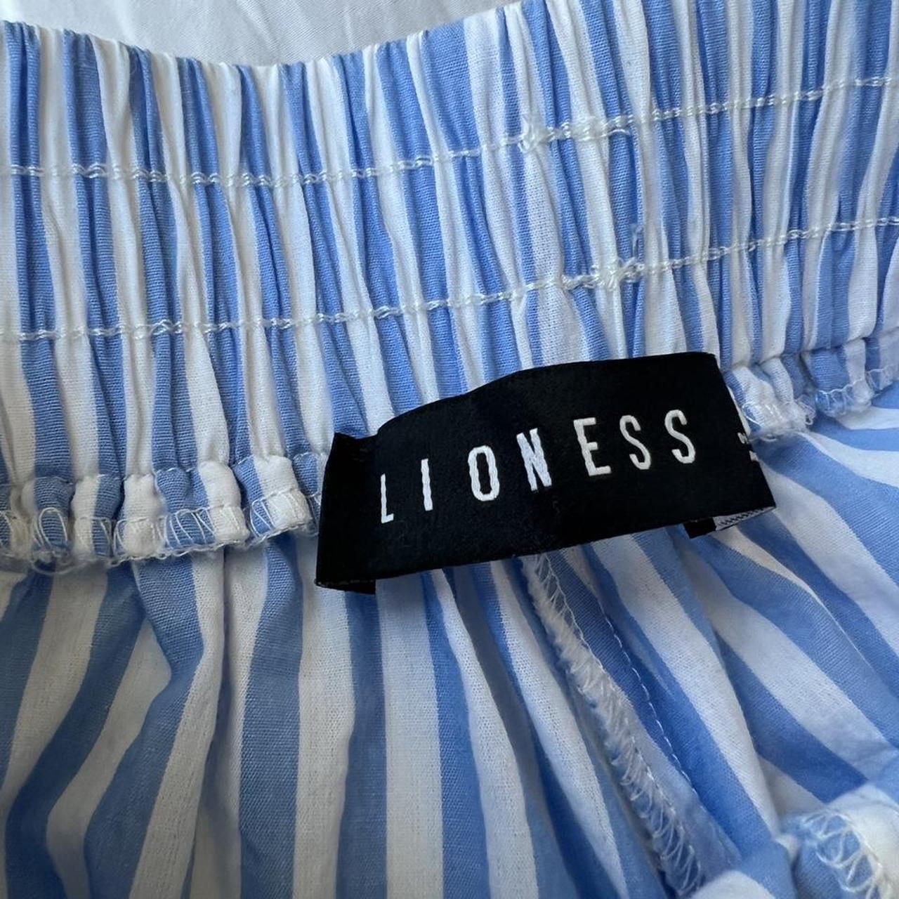 Lioness Men's White and Blue Shorts Depop