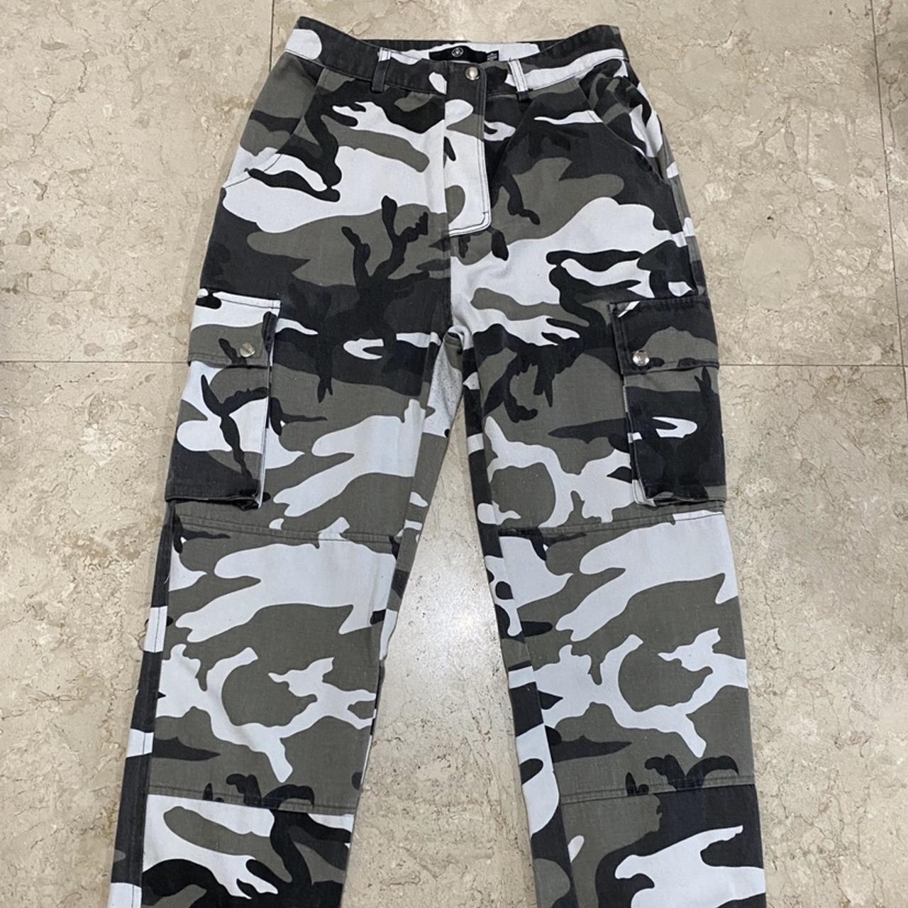 Green black and white camouflage pants from... - Depop