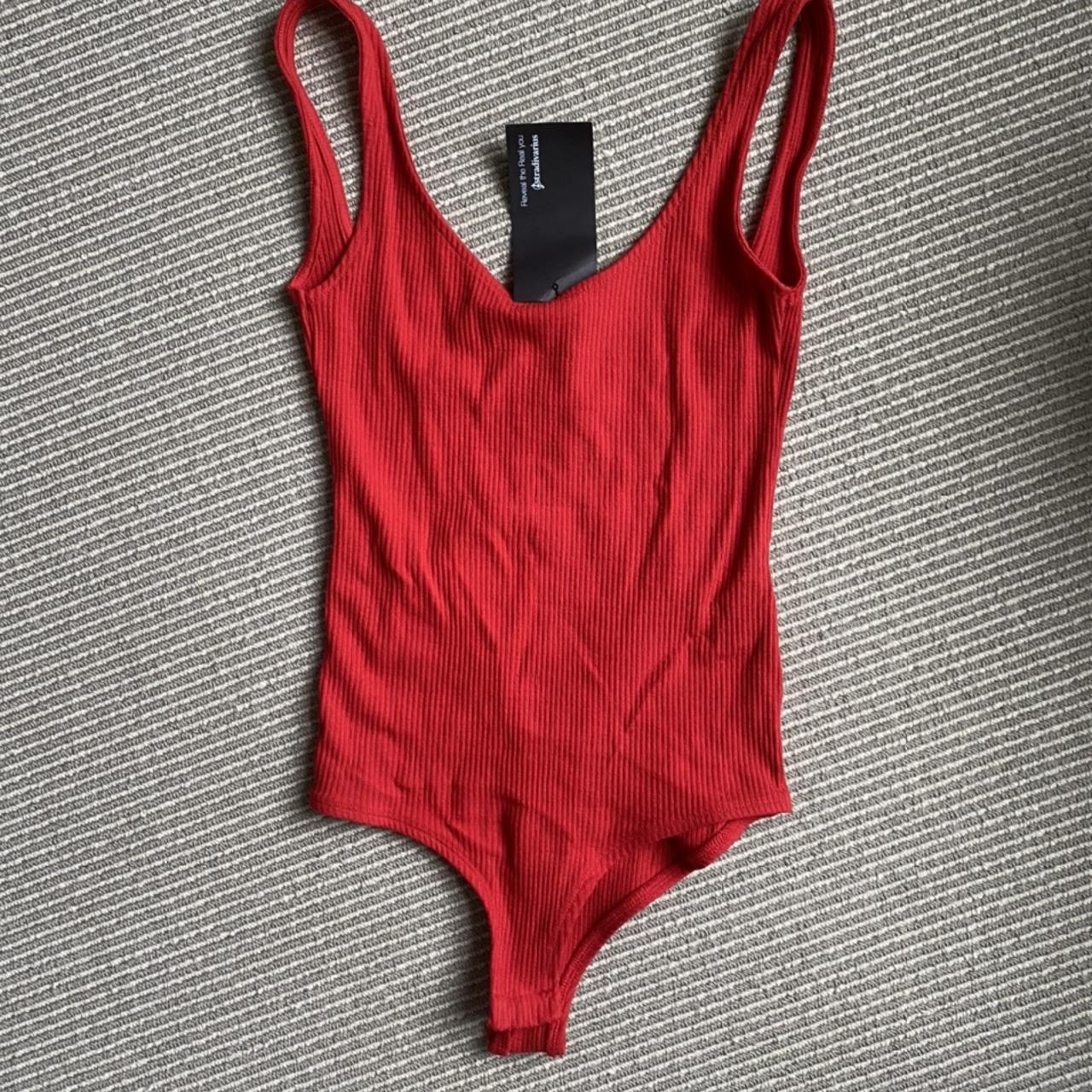 bright red bodysuit