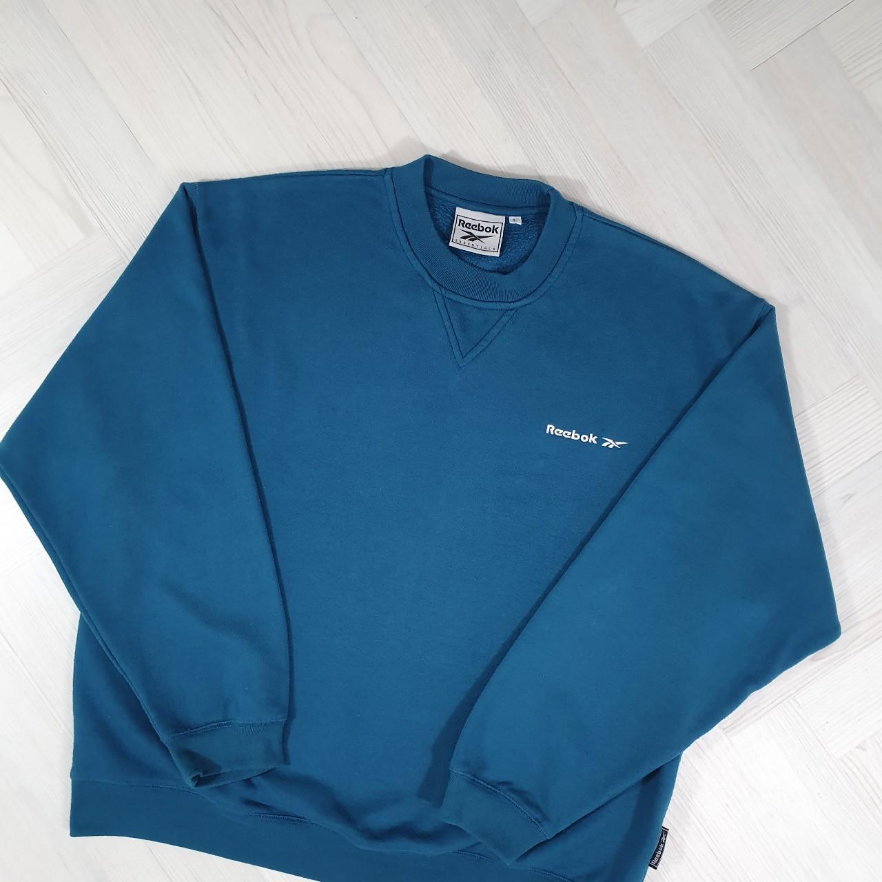 Vintage/Retro blue Reebok sweatshirt with... - Depop