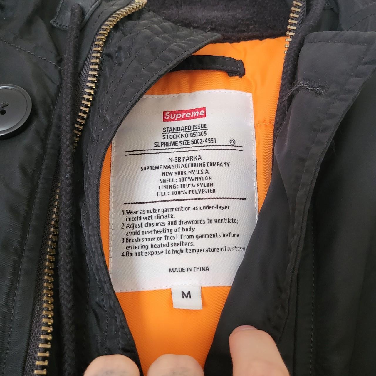 Supreme orange cheap coat