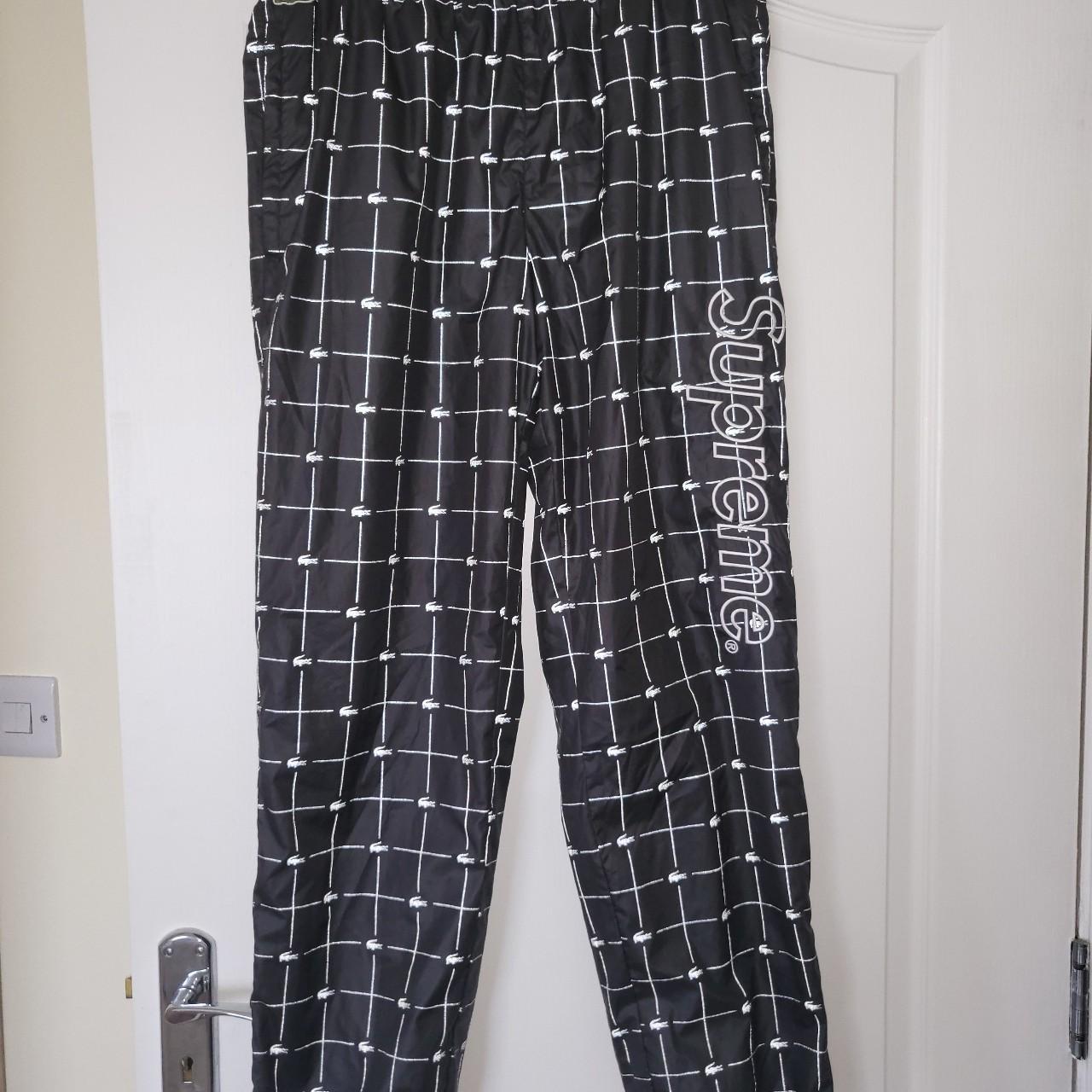 Supreme lacoste reflective track pants , Size small...