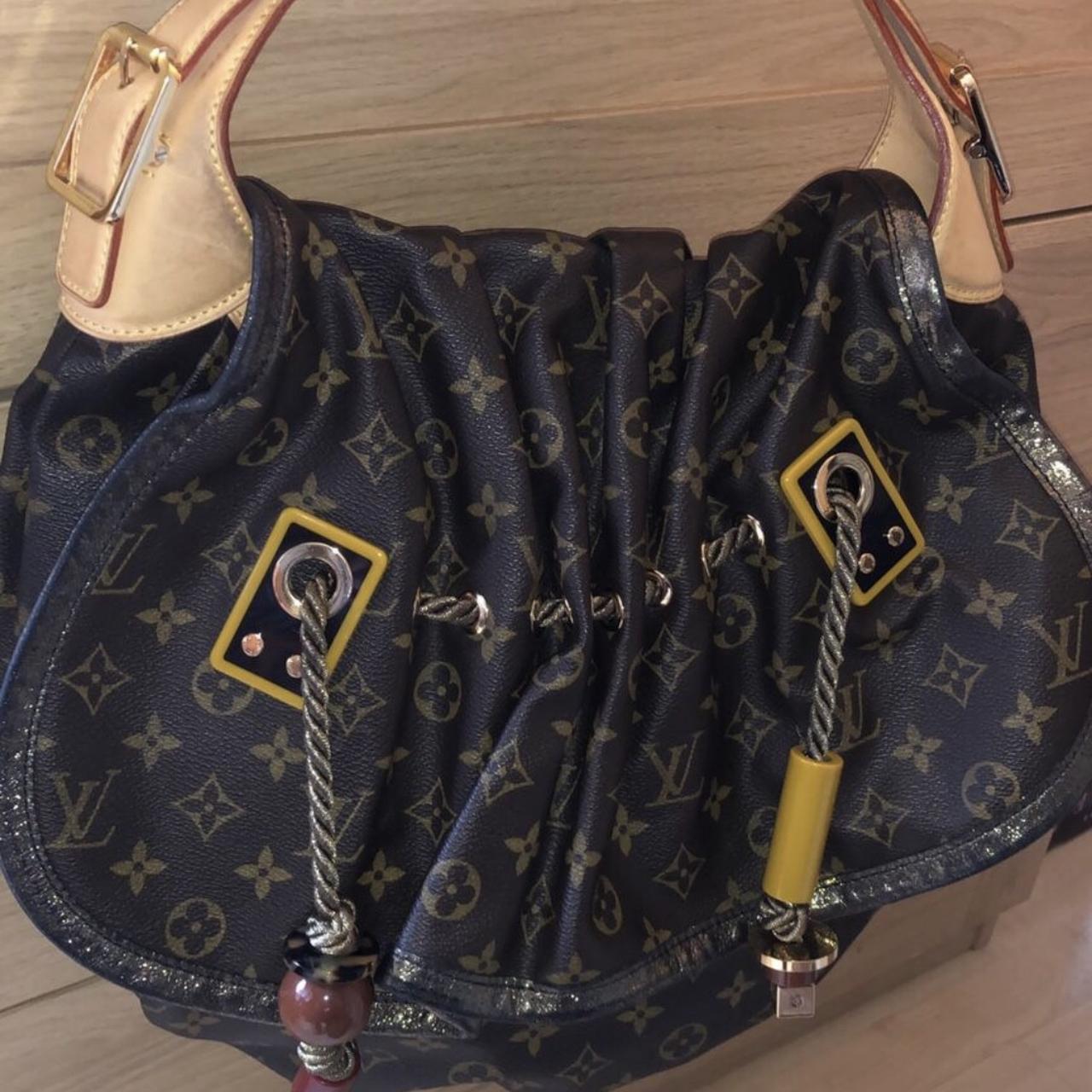 Louis Vuitton, Bags, Louis Vuitton Kalahari Madonna Bag