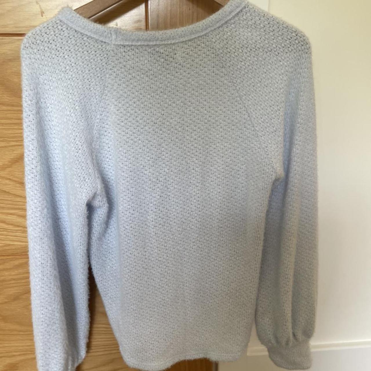 Light blue knitted jumper. With cuffed sleeves.... Depop
