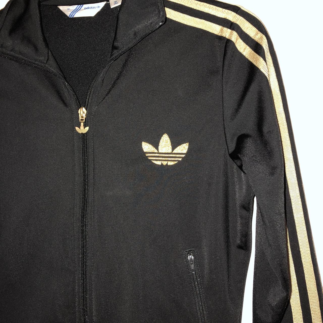 Black and outlet gold adidas jacket