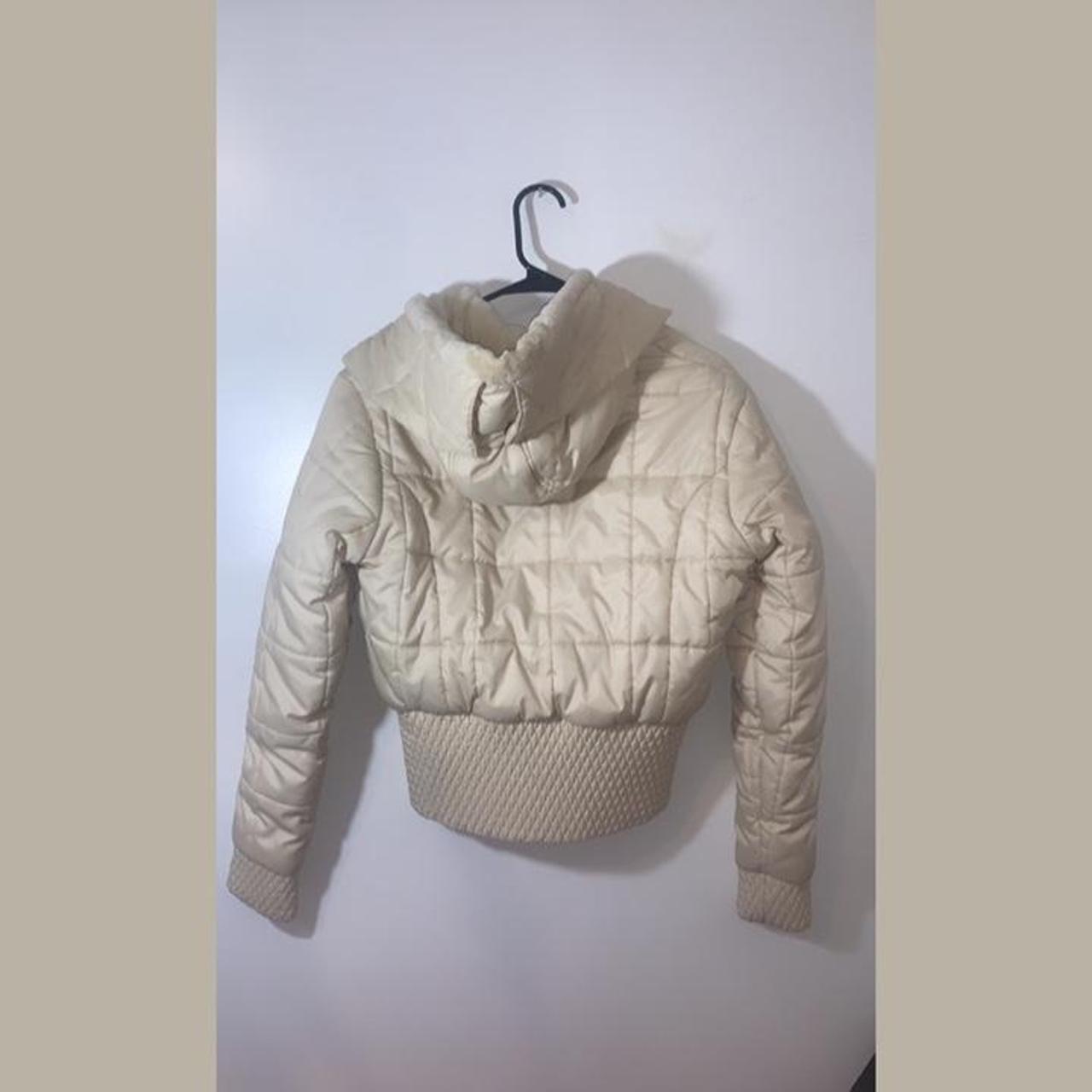 Cream Puffer Jacket with hoodie. Size small. Fits a... - Depop