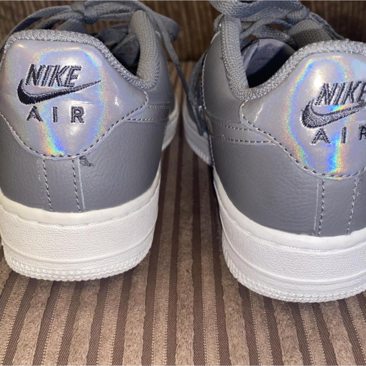 nike air force with holographic tick