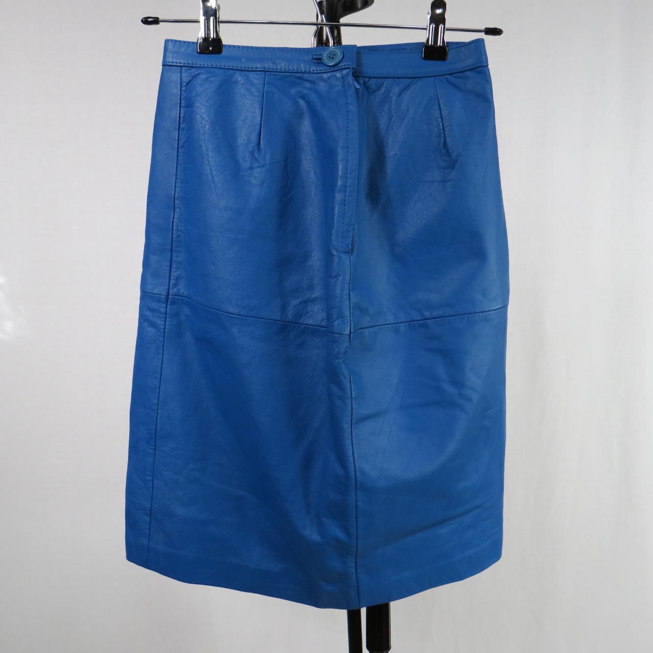 Vintage Avon blue leather skirt. Rear zip... - Depop