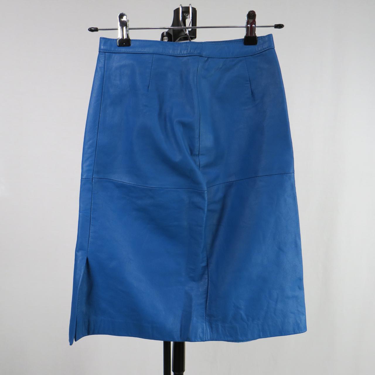 Vintage Avon blue leather skirt. Rear zip... - Depop