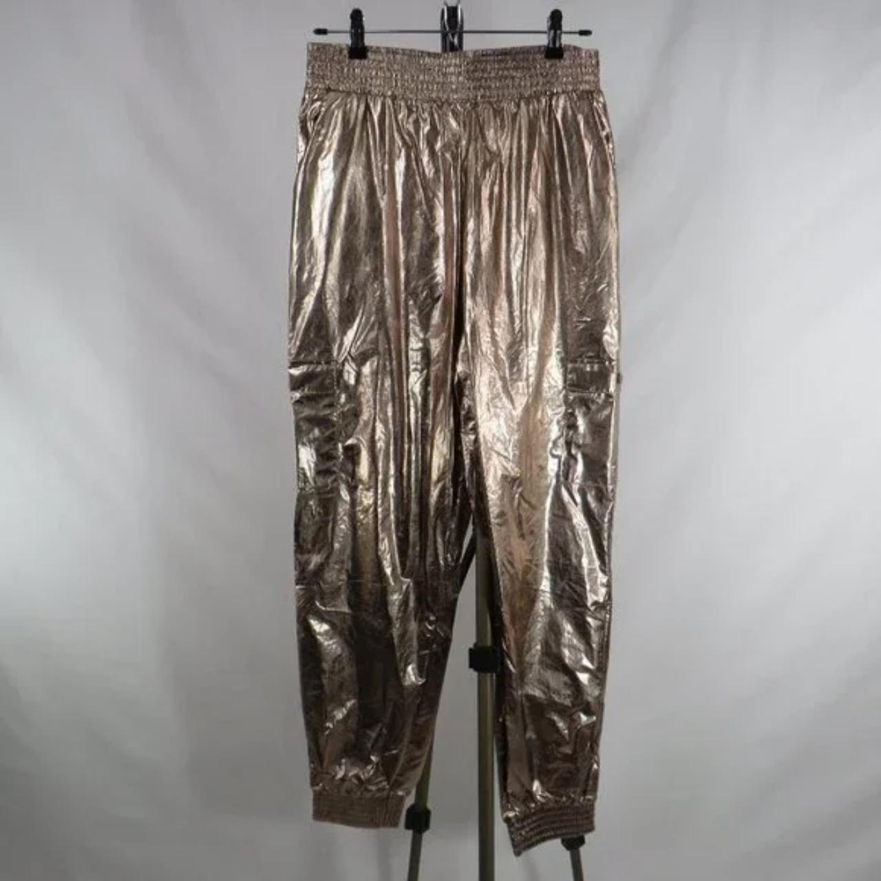 Gold Victoria Sport windbreaker high-rise pants with... - Depop