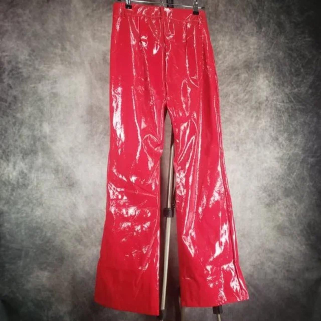 Red faux leather high-rise pants. No name brand tag... - Depop