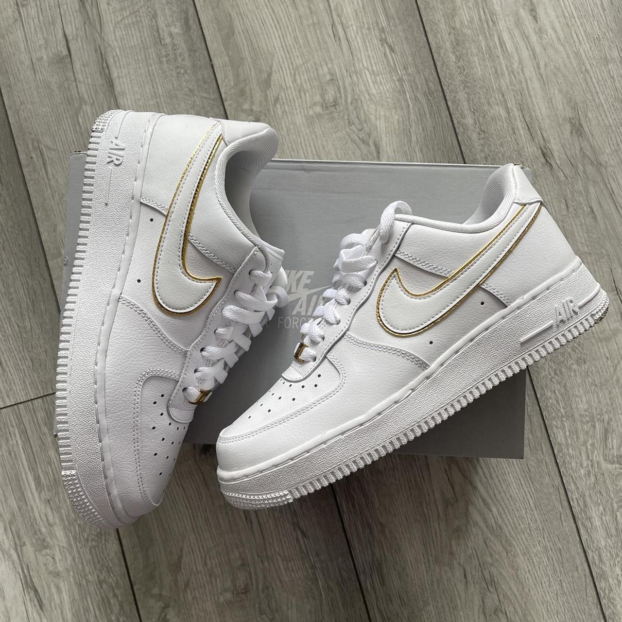 Nike Women's White and Gold Trainers | Depop