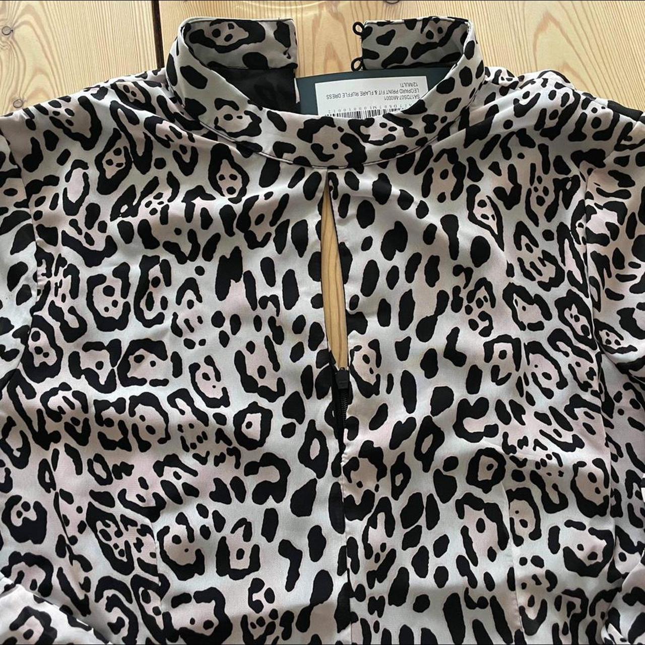 Sosander animal print dress. Keyhole cut out on the... - Depop