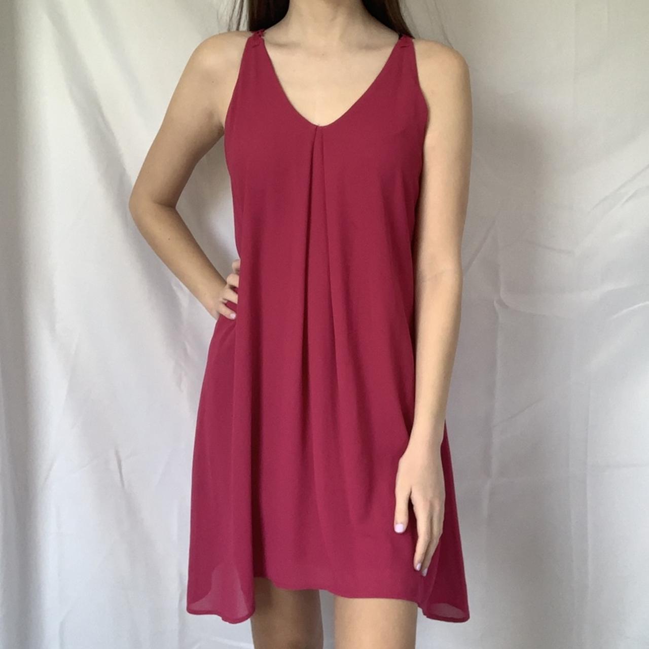 Miami bright pink midi flowy dress. Tiny stain on... Depop