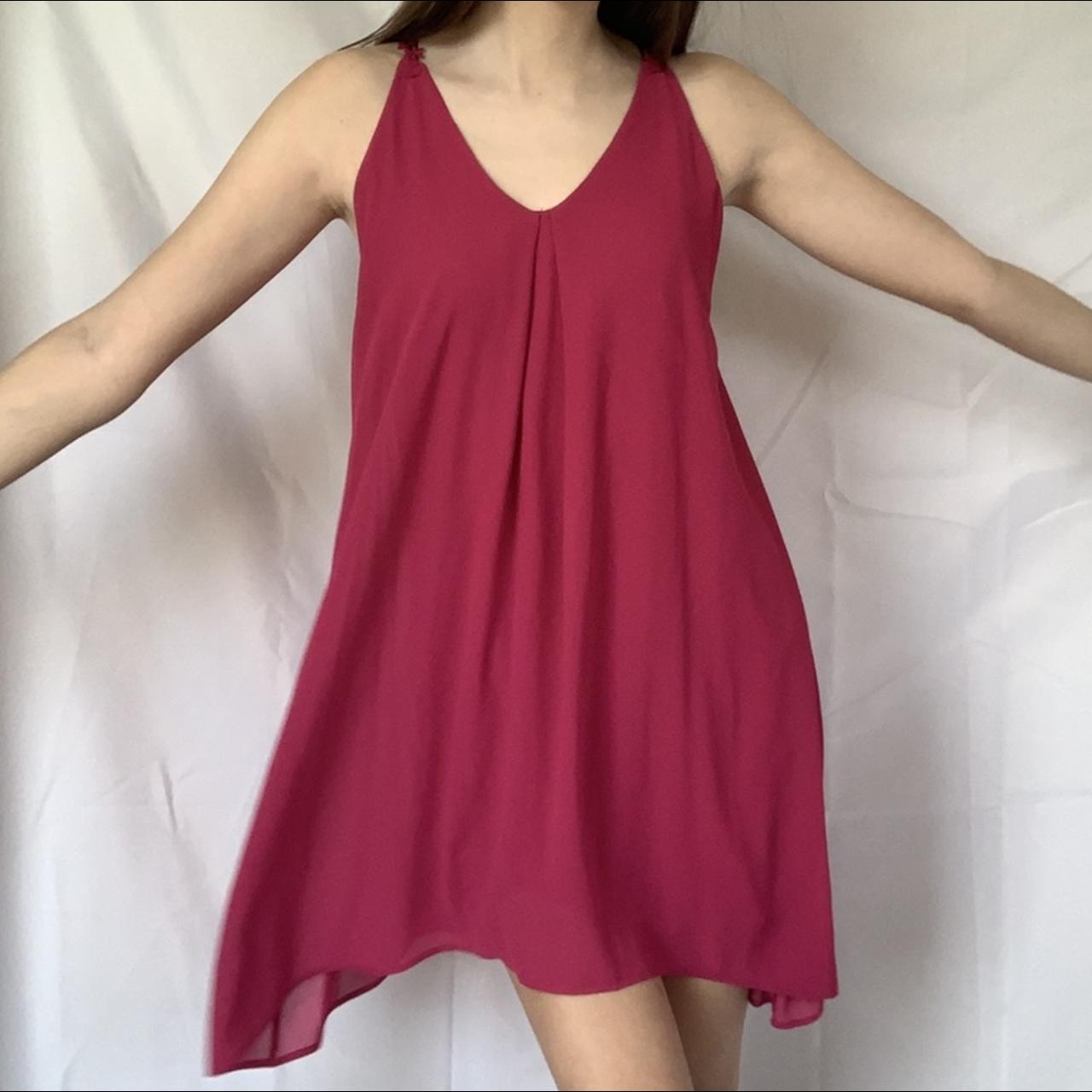 Miami bright pink midi flowy dress. Tiny stain on... Depop