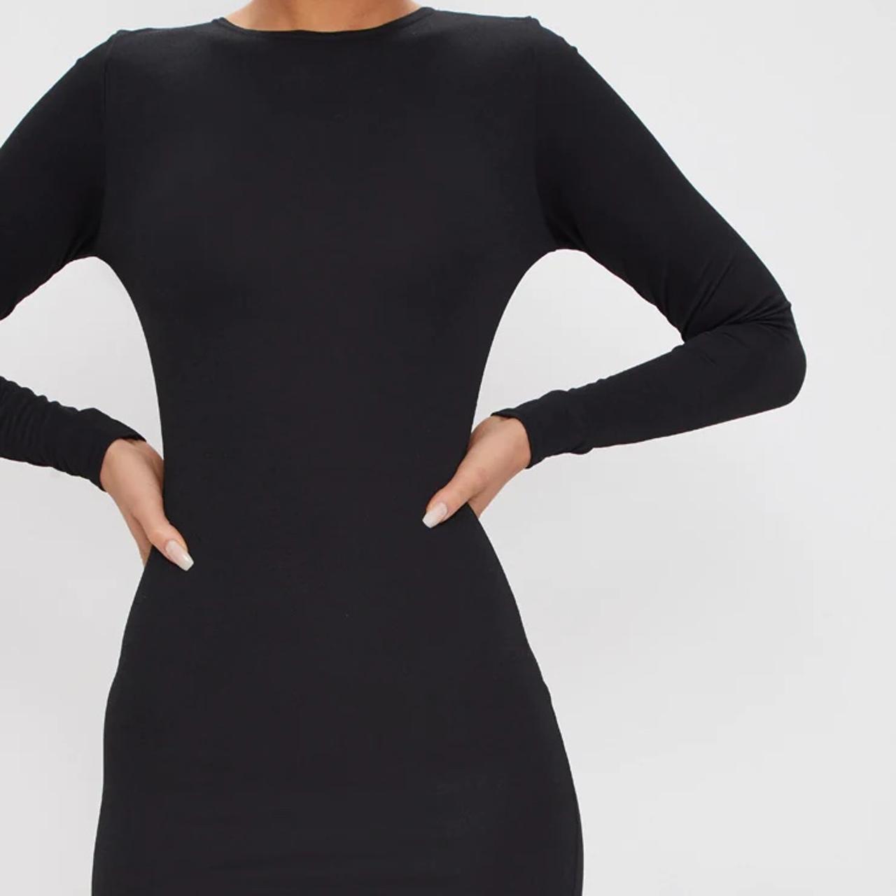 Pretty Little Thing black long sleeved curved hem... Depop