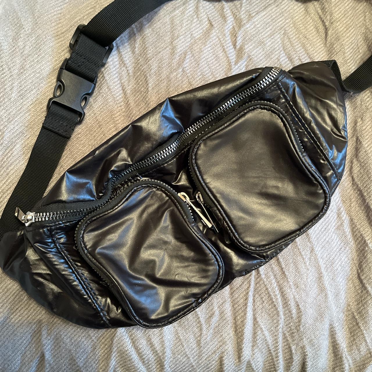 Black shiny bum bag one large main pocket two