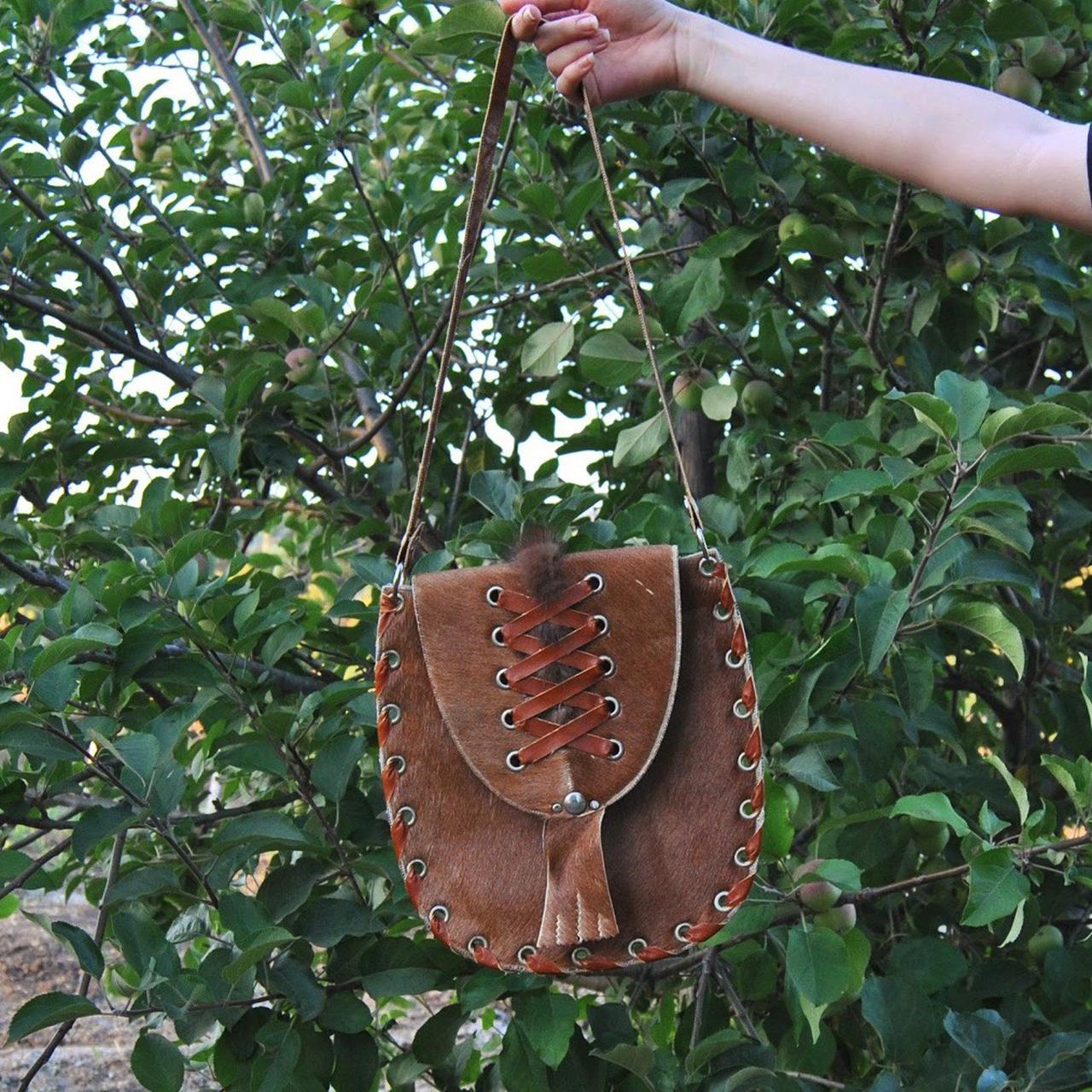 Beautiful cowhide purse. This purse is one of a... Depop